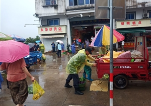 理性文明规范执法  管方菜农双双称赞——宗保公司驻歙县市容项目